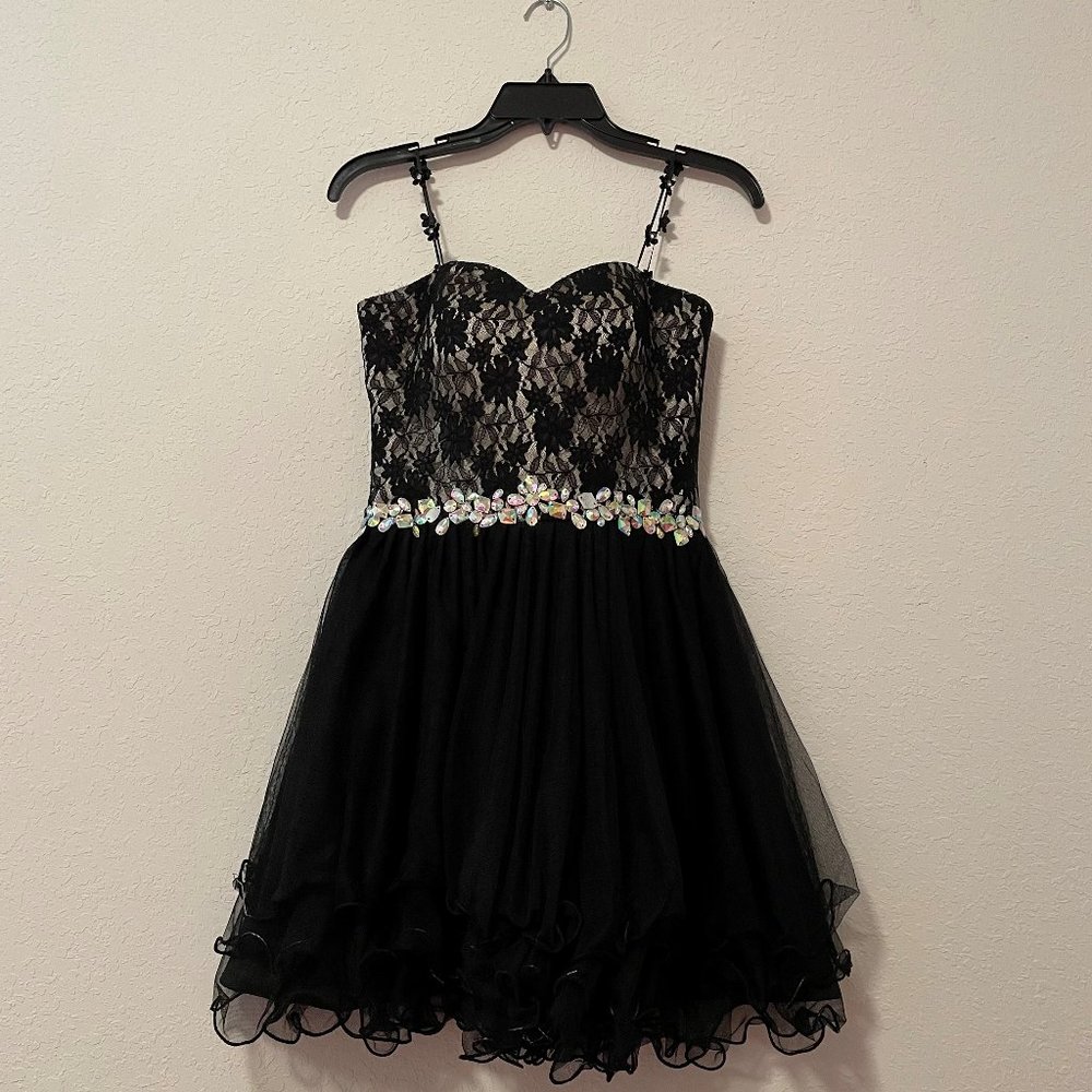 Short black dress with flirty skater skirt